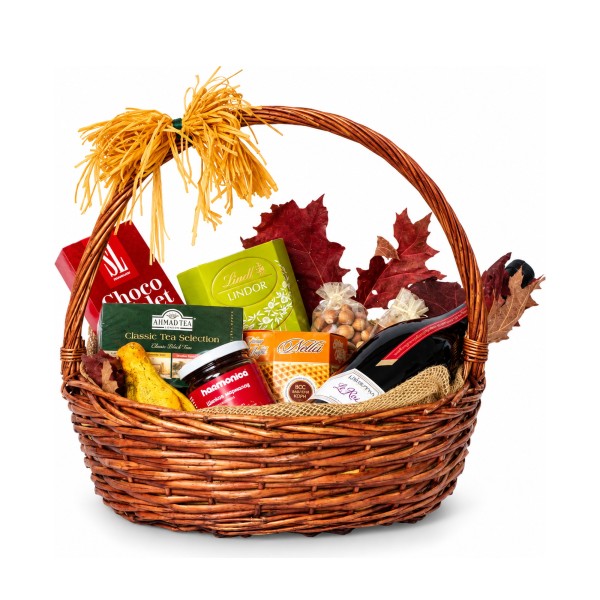 Autumn – basket with wine, tea and rosehip jam