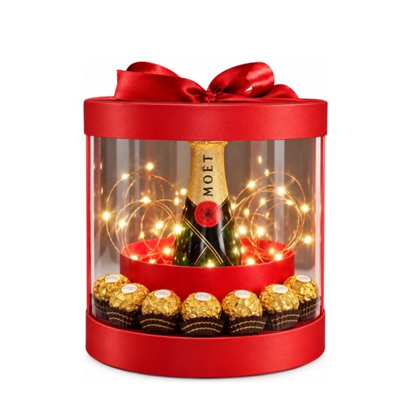 Moët на светлинки – шампанско в червена прозрачна кутия с Ferrero