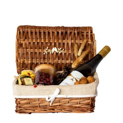 Picnic – hamper with honey, rosehips and white wine